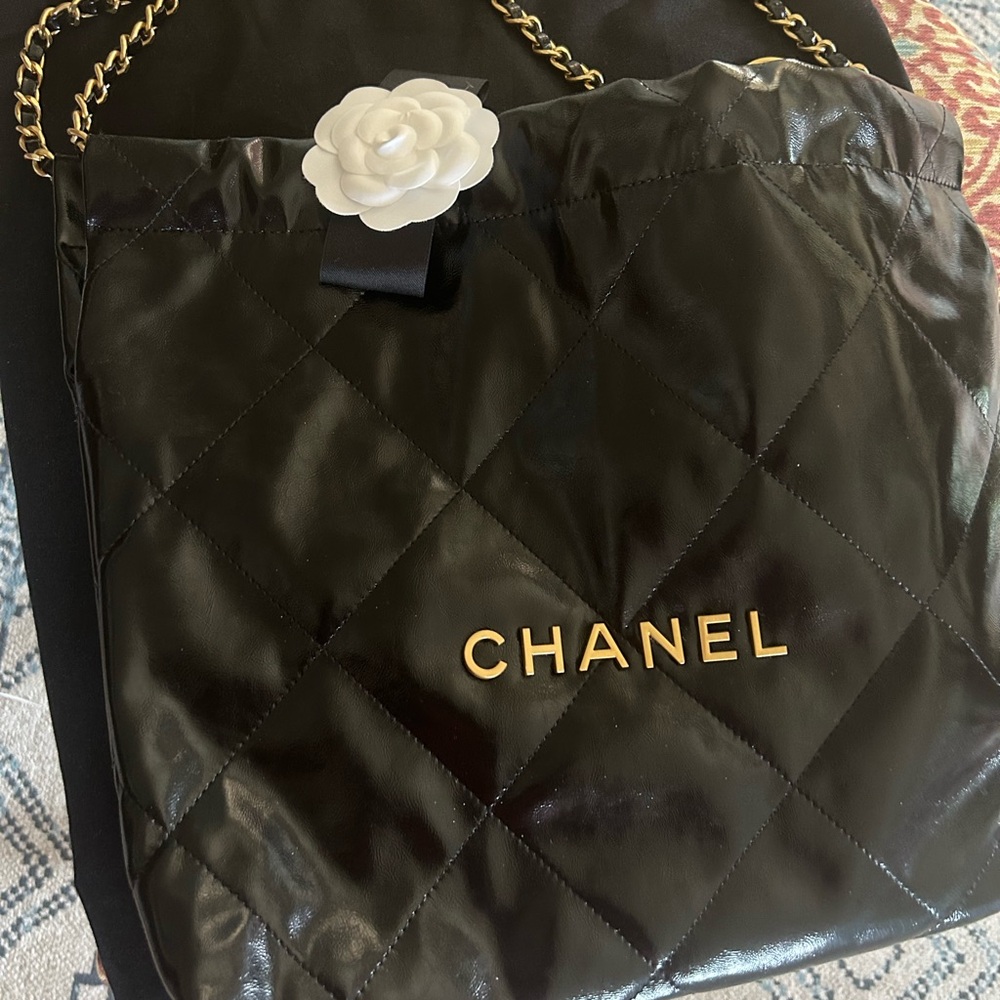 Women’s black Chanel purse .,I purchased it from eBay,
